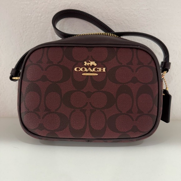 Coach Handbags - Coach Burgundy Signature Crossbody Bag with Glossy Finish
